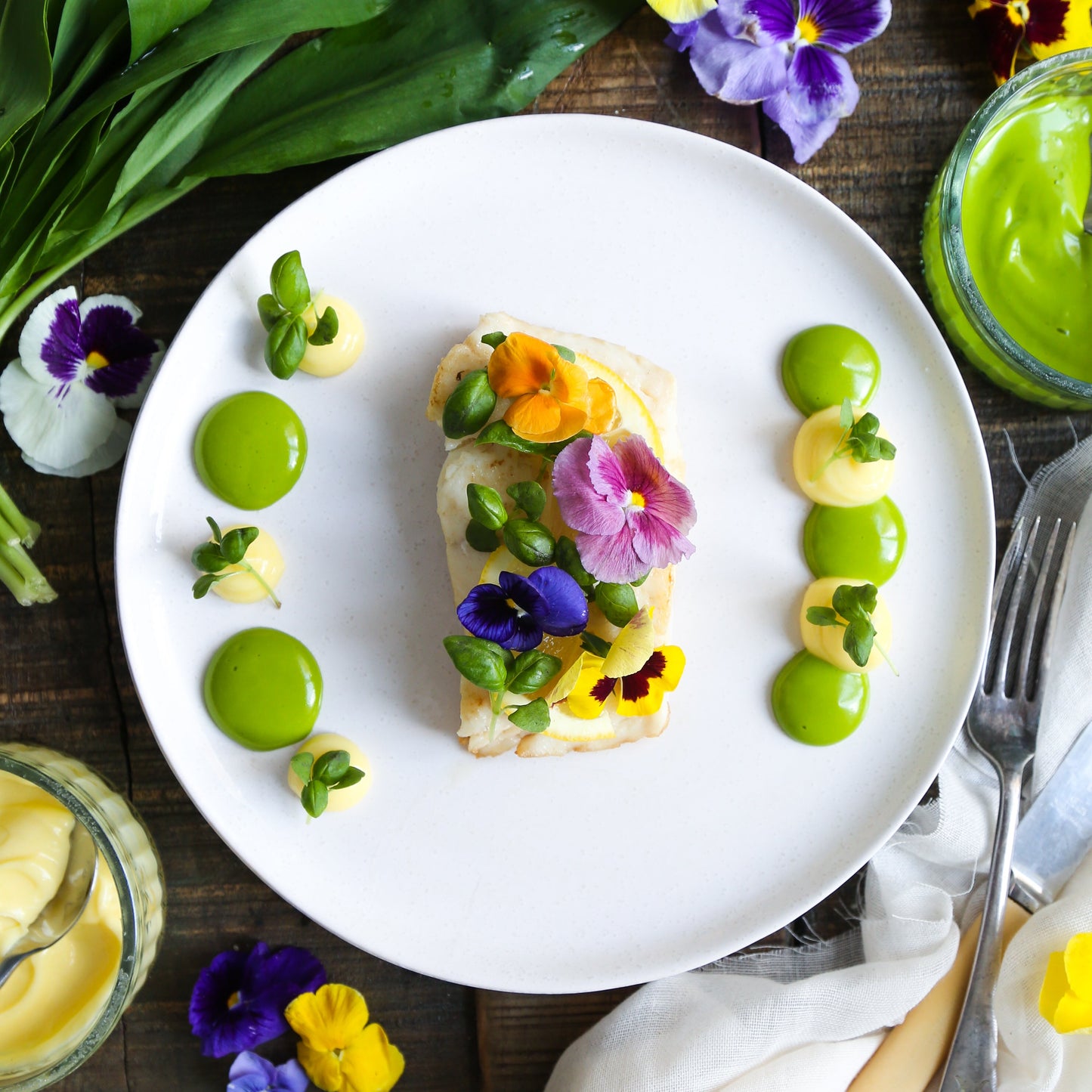  Roasted cod with wild garlic mayonnaise/ aioli and edible flowers