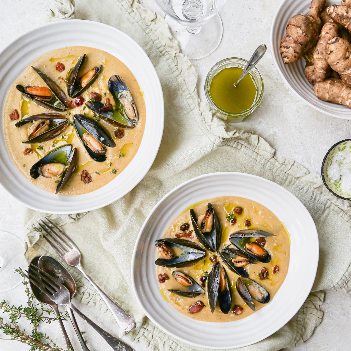 Jerusalem artichoke chowder / soup with mussels and chive oil